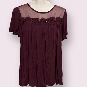Torrid burgundy top with sheer yoke . Sz 0